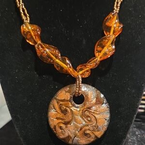 Elegant Amber and Brown Colored Glass Pendant Necklace